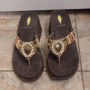 Volatile Brown and Gold Sandals with Heart Embellishments